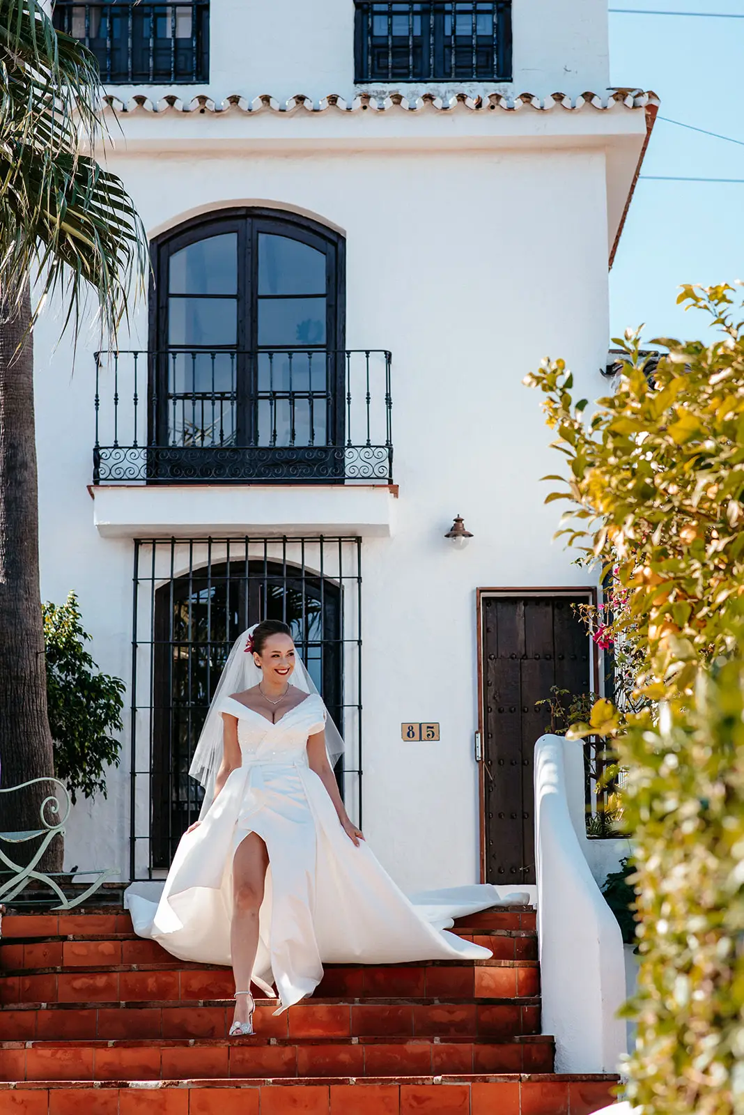 Destination wedding ceremony at a historic European villa in summer